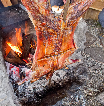 Un asado típico / A roast lamb asado or barbecue